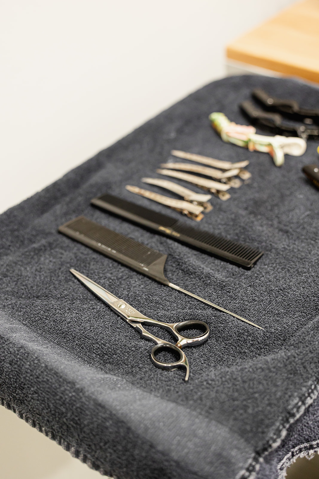 Salon tools laid out on towel